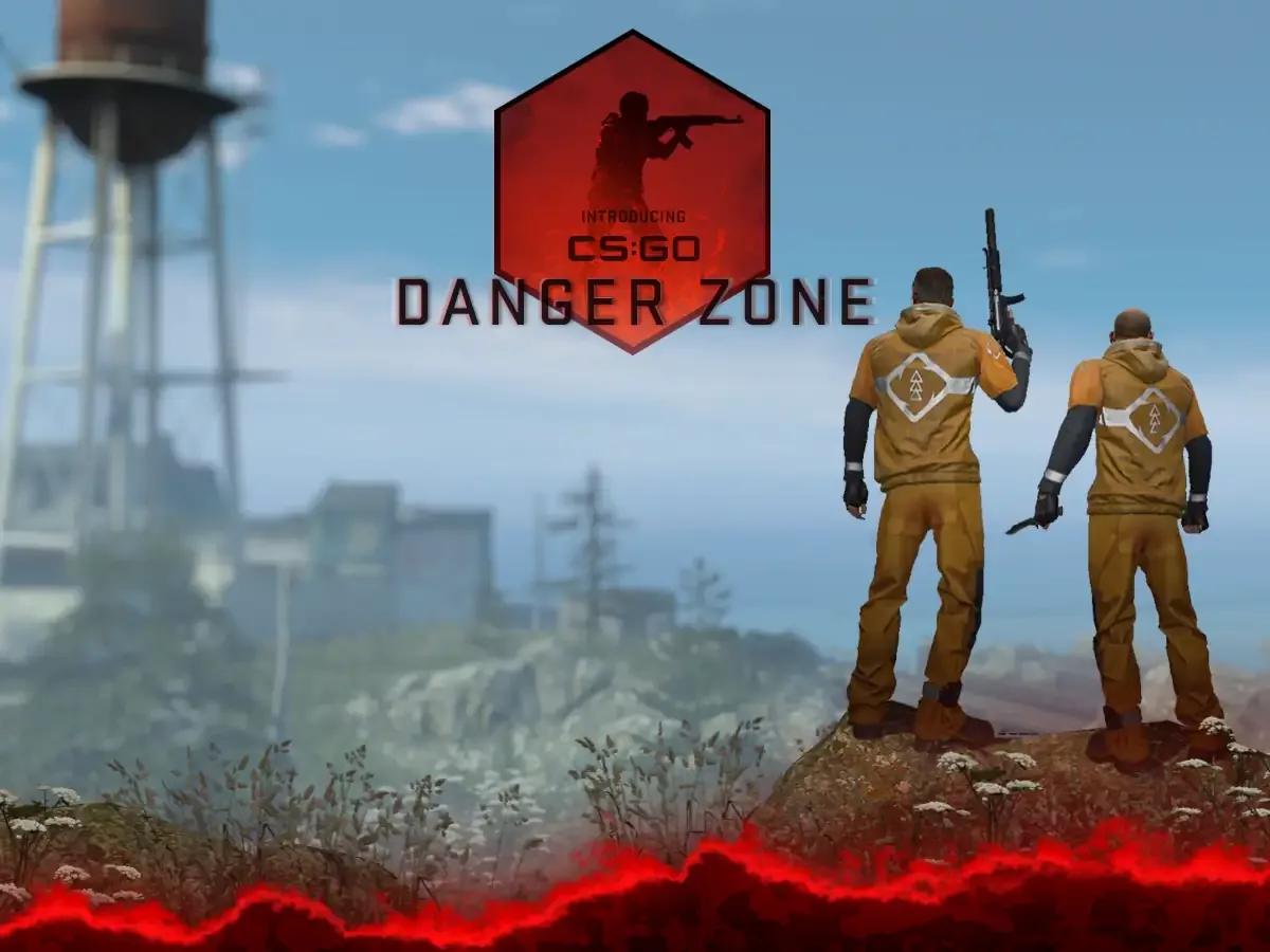 Dva naoružana lika u narandžastim odelima na uzvišenju, uz CS:GO Danger Zone logo i toranj u pozadini.